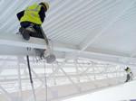 Hiline Abseiling removing dust in the above a swimming pool