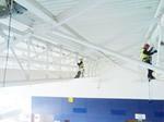 Hiline Abseiling removing dust in the above a swimming pool