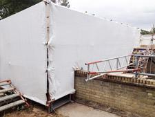 Shrink wrapped scaffolding accross a river